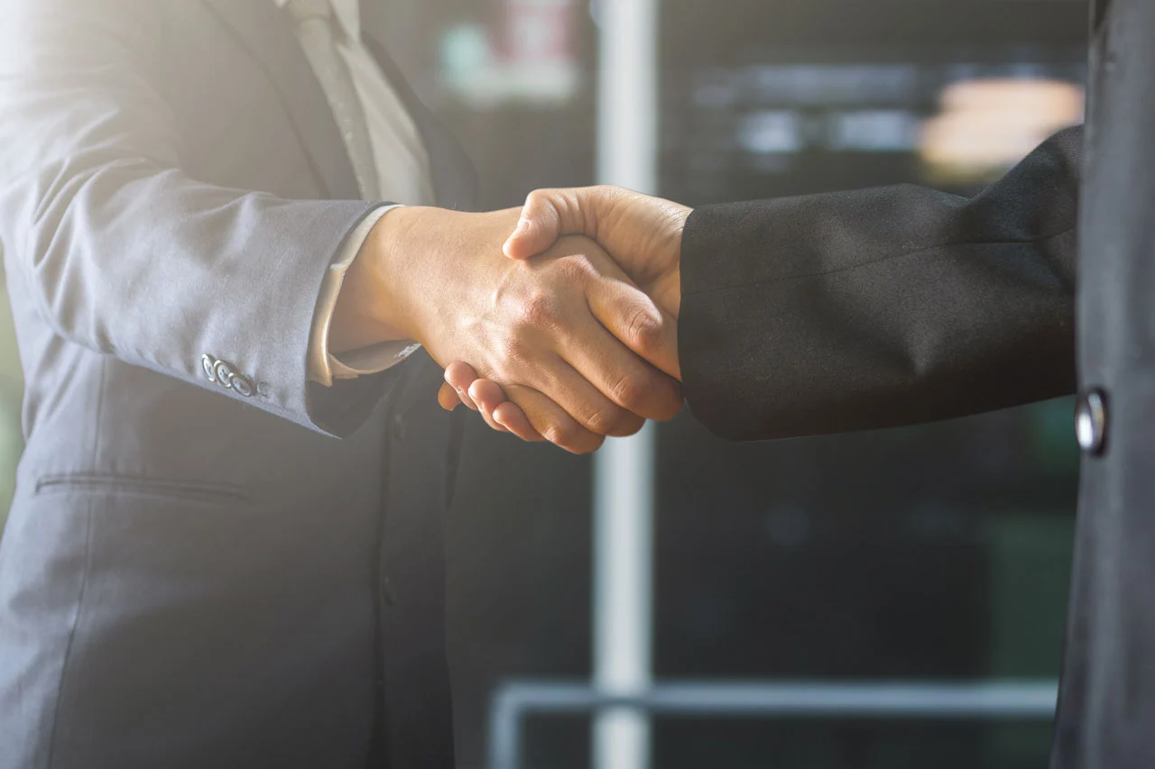 successful-negotiate-handshake-concept-two-businessman-shake-hand-with-parthner-celebration-partnership-teamwork-business-deal